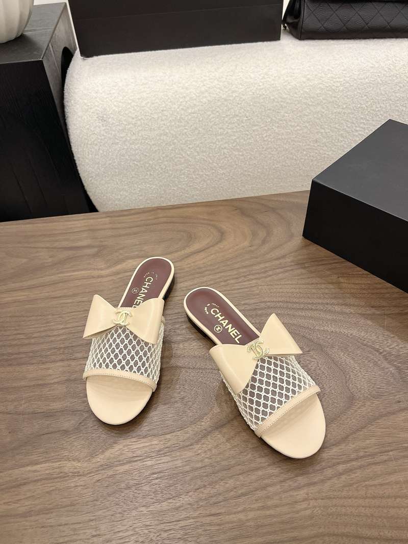 CHANEL Bow Raffia Slides — صورة 1