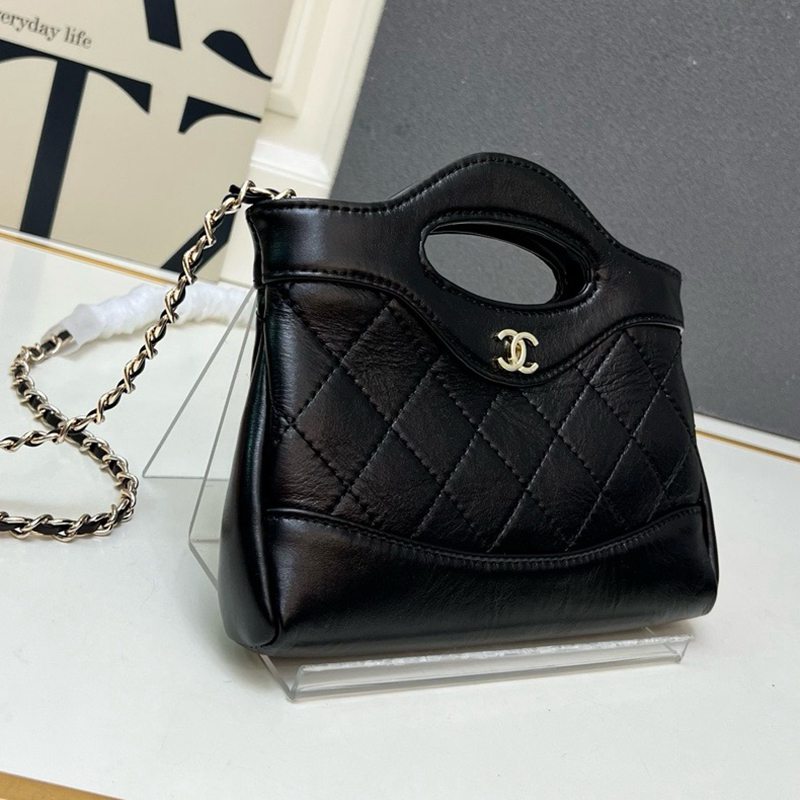 Chanel Quilted Mini Top Handle Bag — صورة 1